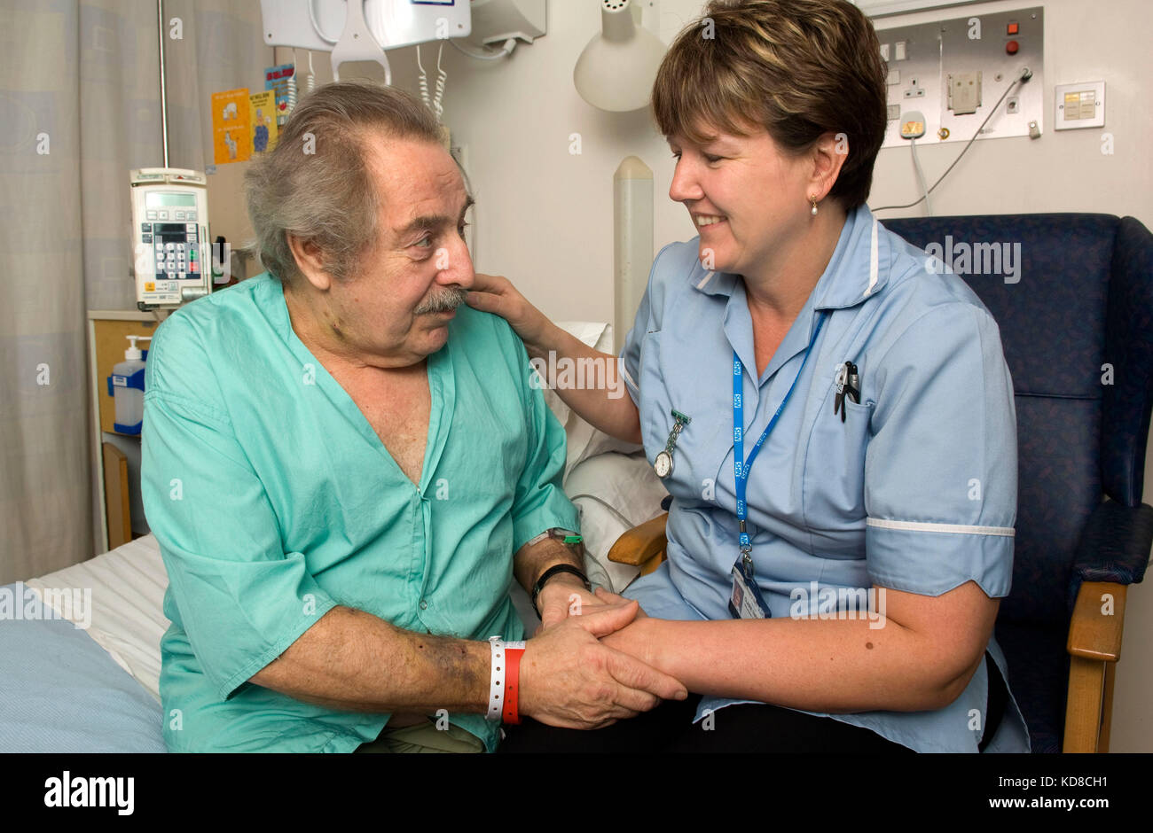Claire Thomas with Bill Hardingham, who she assisted when he collapsed outside her home, together in the Royal United Hospital, Bath. Stock Photo