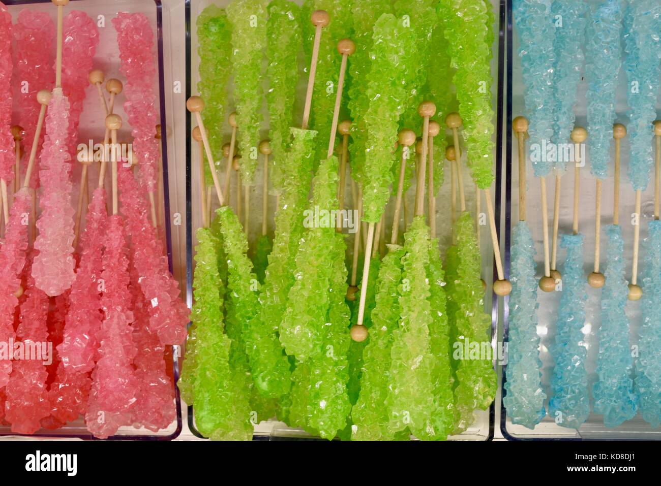 Hand crafted, colorful hard rock candy on a stick at Door County Candy Confections Factory in Door County community of Sturgeon Bay, Wisconsin. Stock Photo