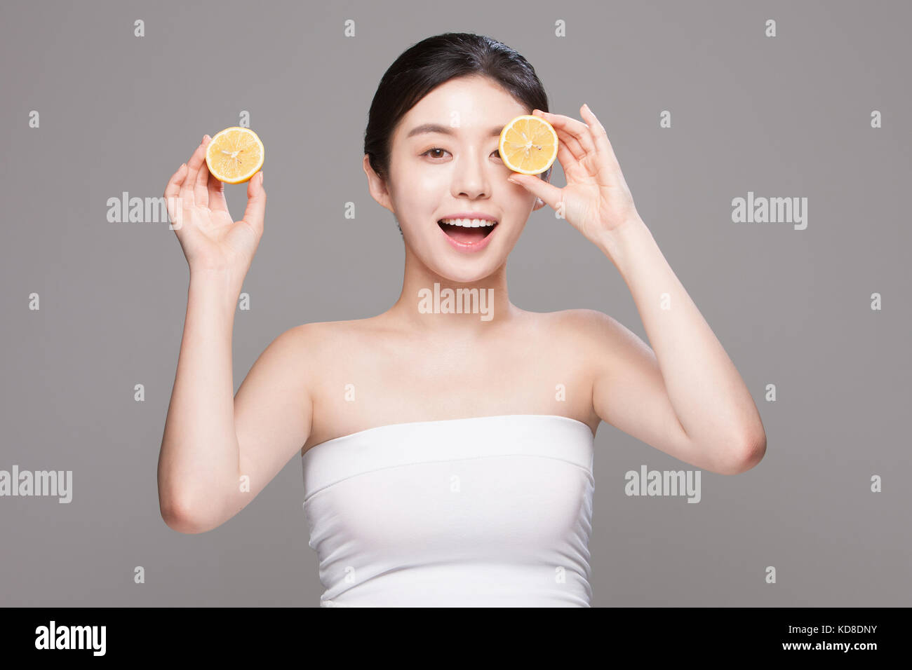 Woman hands face lemons hi-res stock photography and images - Alamy