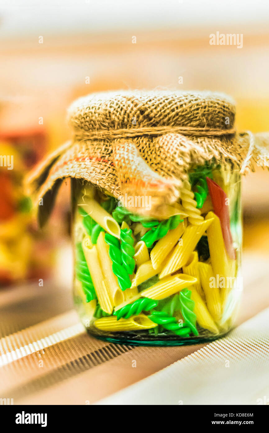 Colored pasta in glass jar Stock Photo Alamy