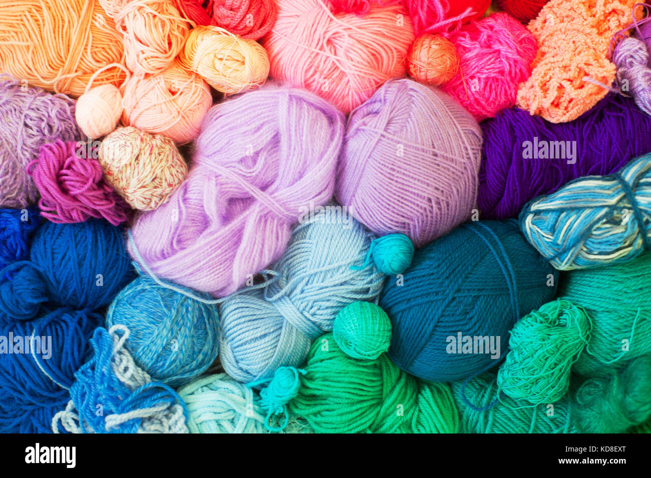 Colored balls of yarn. View from above. Rainbow colors. All colors