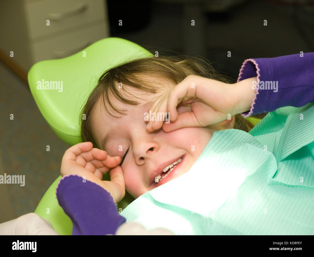 Little girl after dental examination in anesthesia Stock Photo Alamy