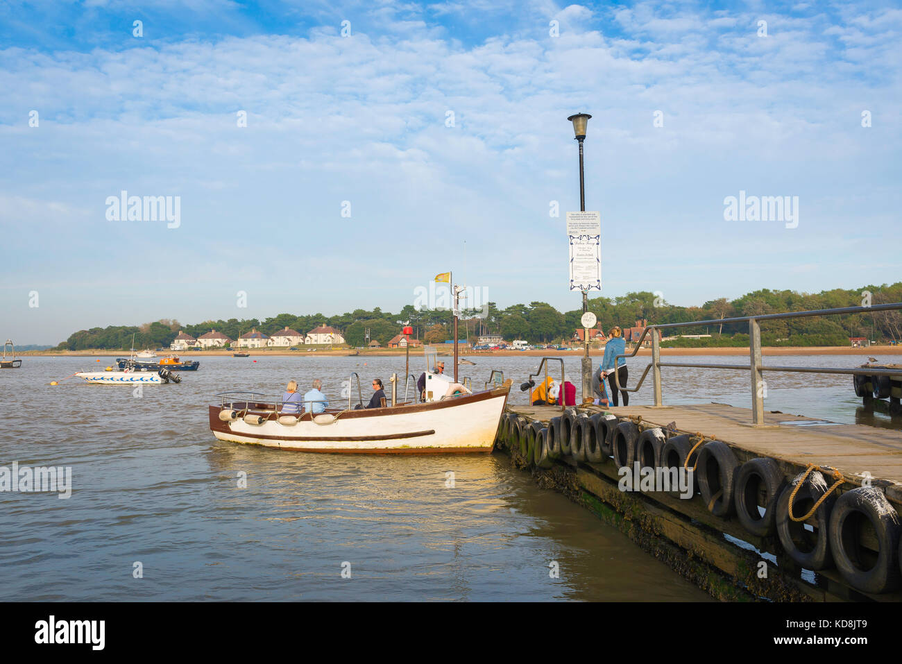 River Deben Suffolk, view of the Felixstowe Ferry boat arriving at the jetty on the Felixstowe side of the River Deben, UK. Stock Photo