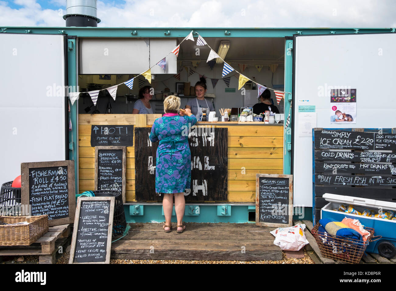 The Dungeness Fish Hut Snack Shack serving a customer in Dungeness
