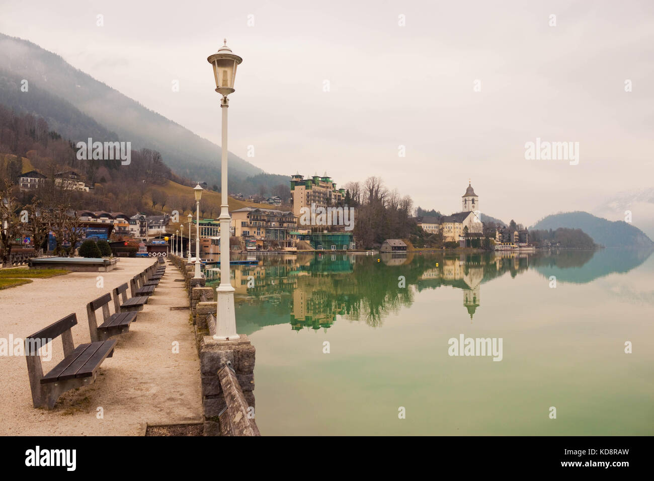 St. Wolfgang, Austria February 19, 2016 View of lakeside promenade with benches and street