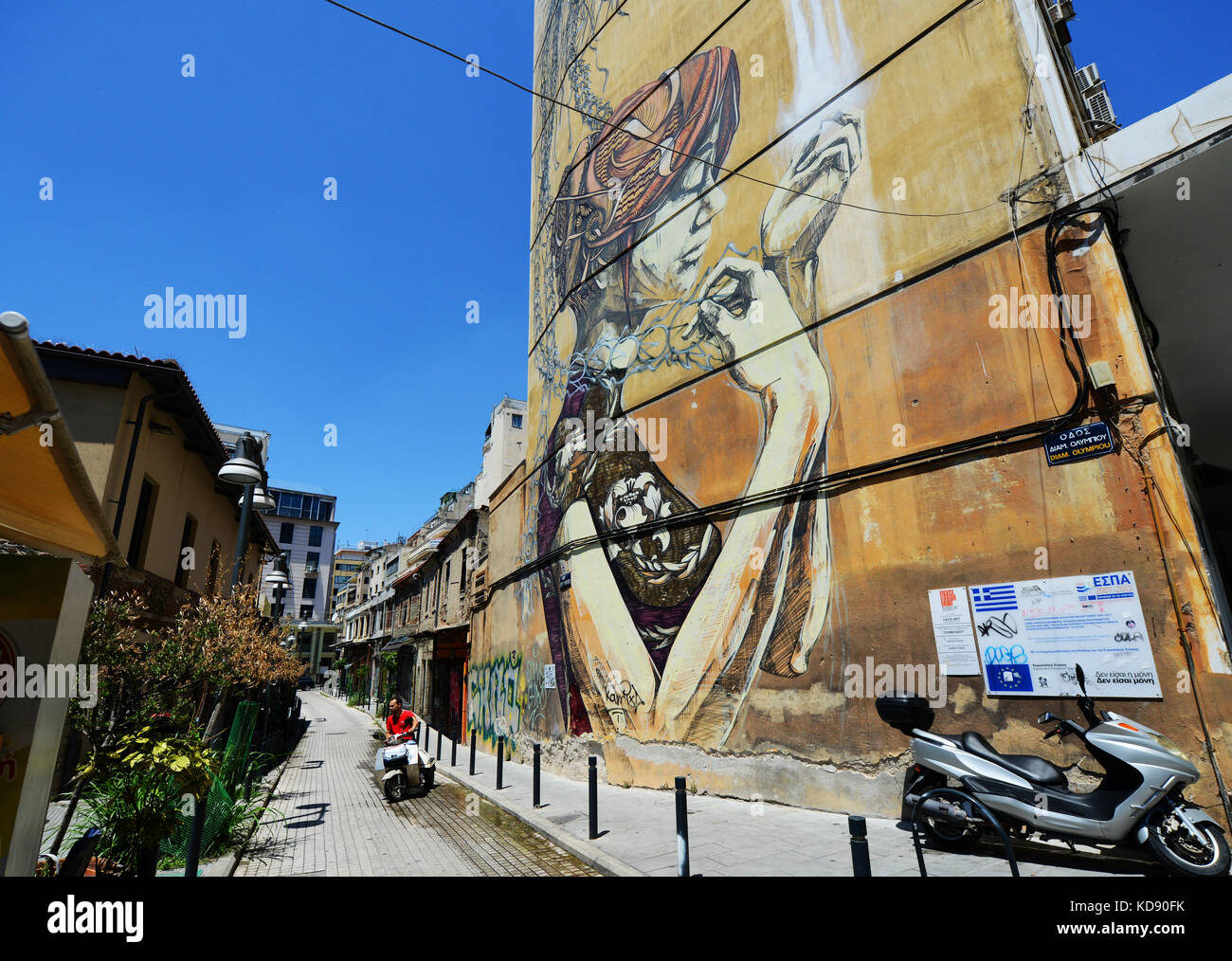 An old building painted with a beautiful wall painting in Thessaloniki, Greece. Stock Photo