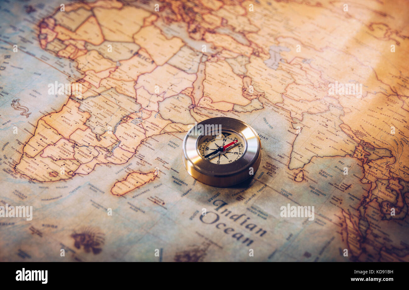 Columbus day and world map with compass Stock Photo - Alamy