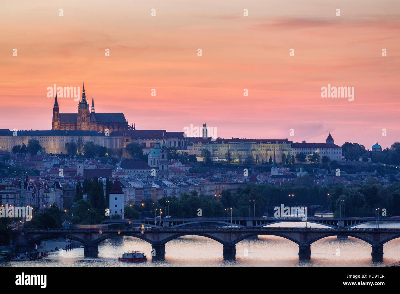Panorama of Prague with red roofs from above summer day at dusk, Czech Republic Stock Photo