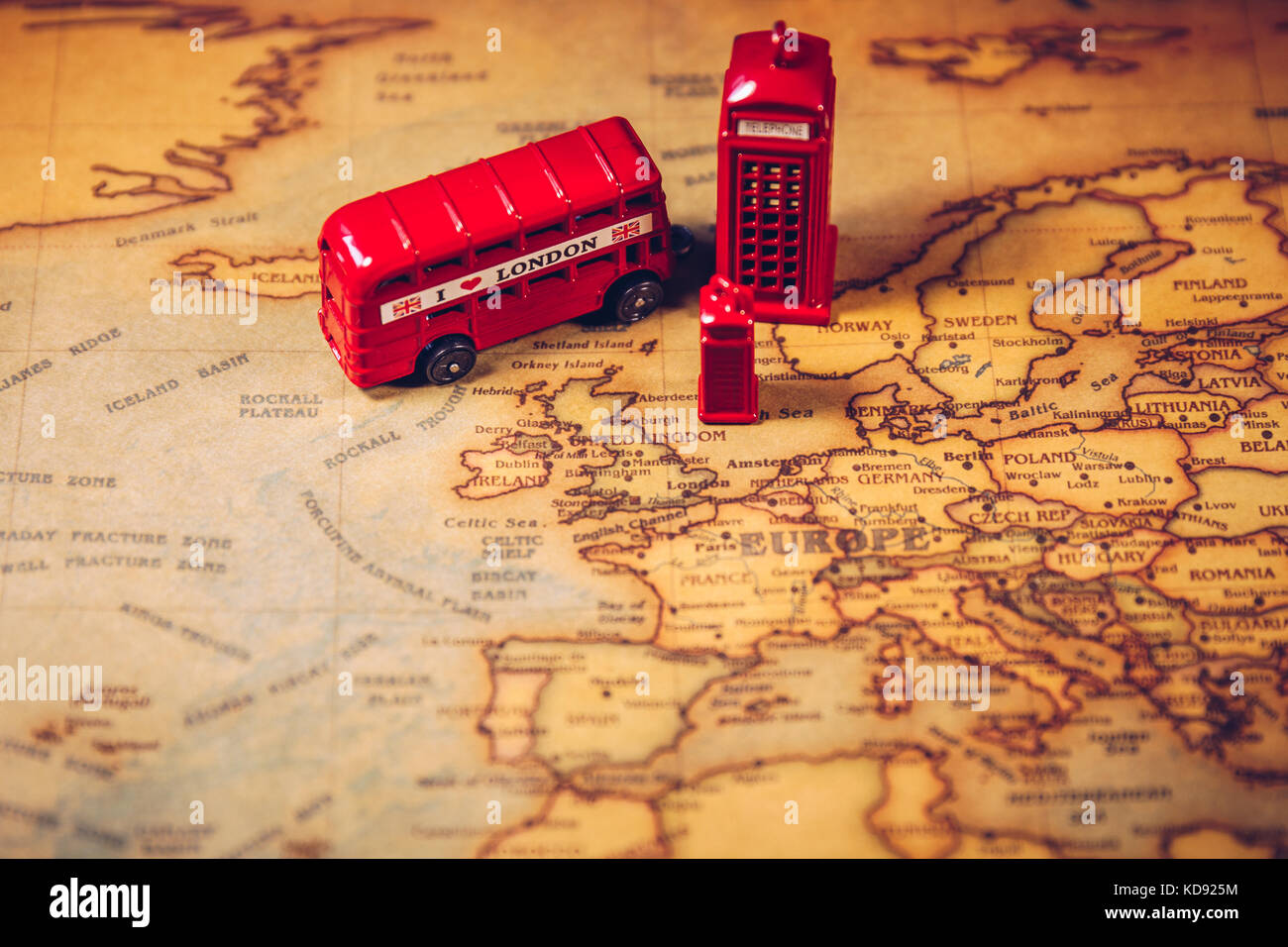 London map with Big Ben, double decker bus in miniature and compass, travel concept. England, UK. Stock Photo