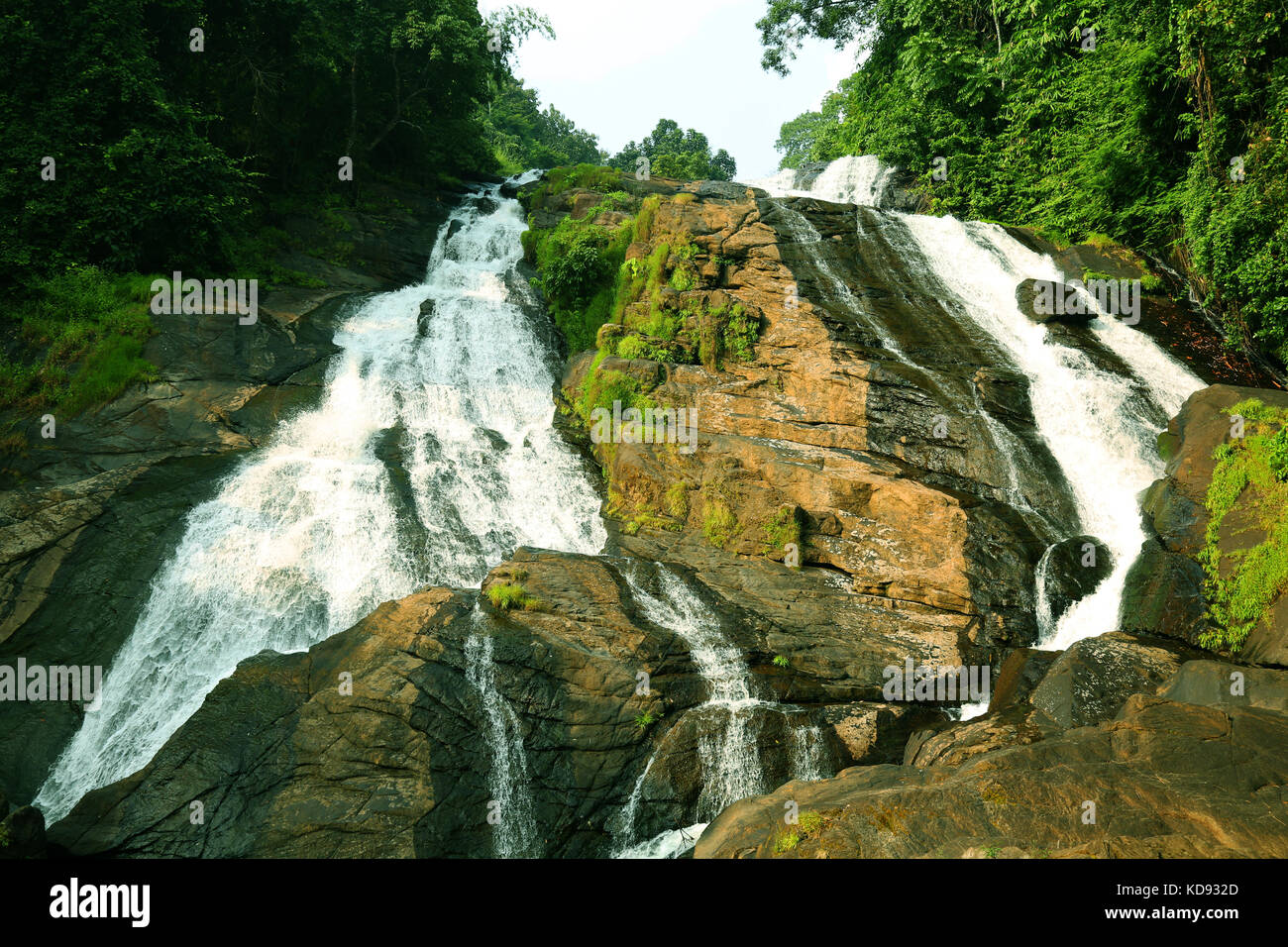 A waterfall in the mountain Stock Photo - Alamy