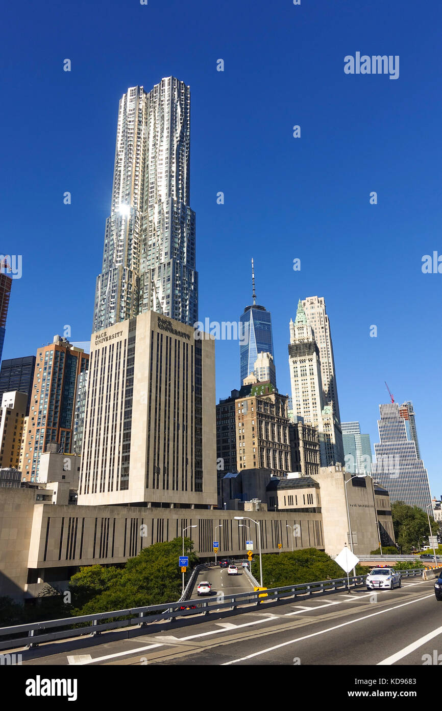 8 Spruce Street tower, and Pace private university in front, Woolworth Building (r) Lower manhattan, United states. Stock Photo