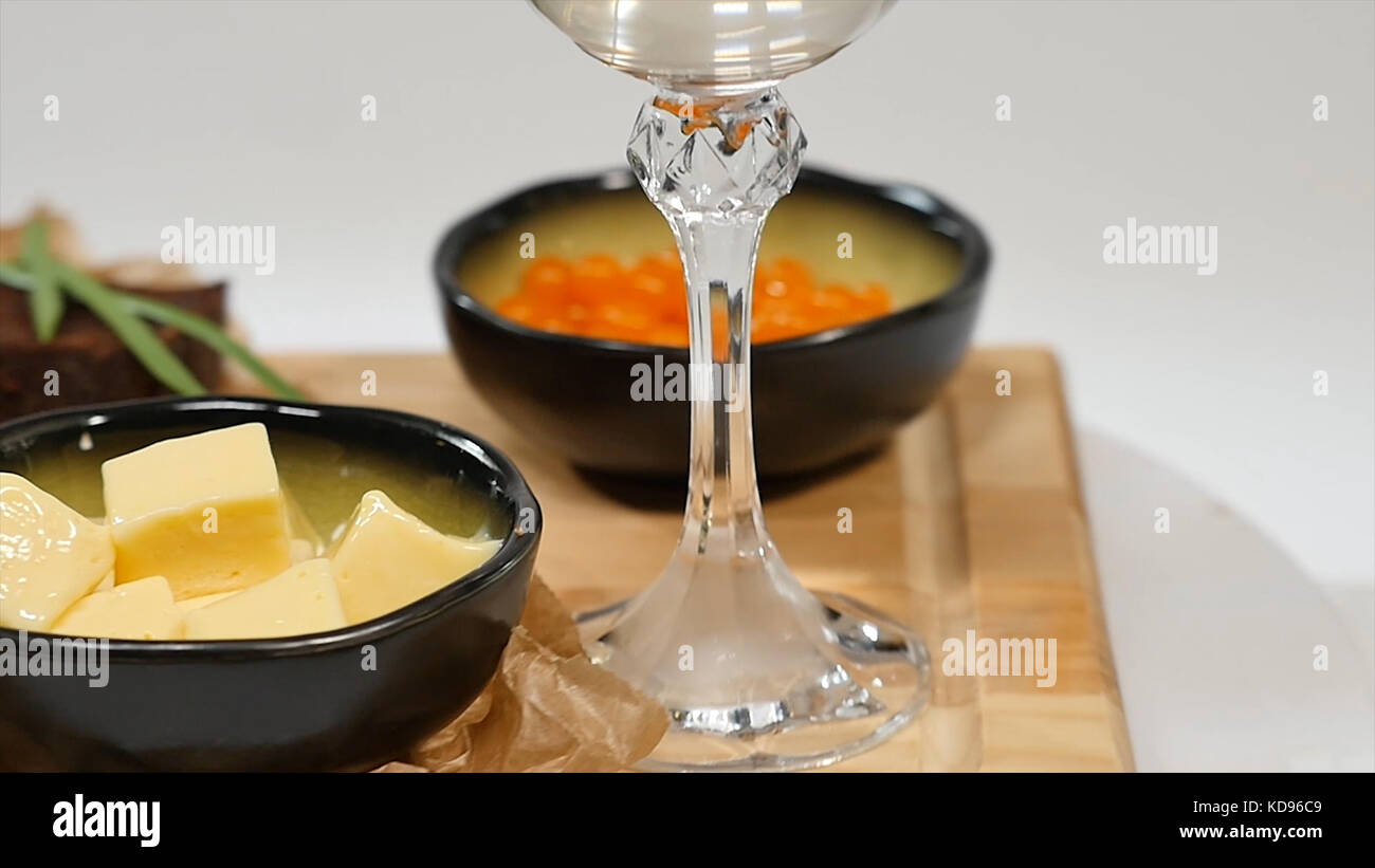 Snack Sandwiches With Butter Red Caviar Crispy Baguette And White Wine On White Background Red Caviar Lemon Greens Bread And Butter Stock Photo Alamy
