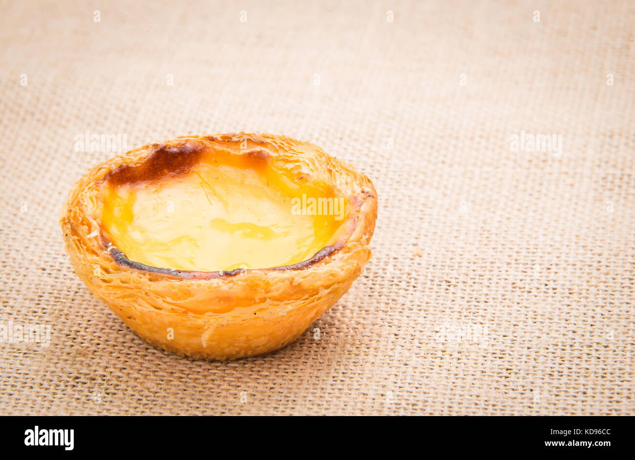 portuguese cookies pasteis de nata or egg tart on line background with copy space for text Stock Photo