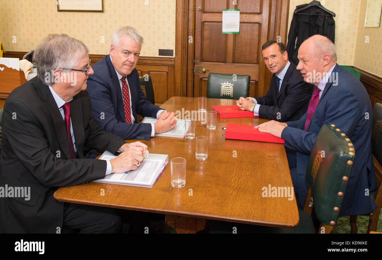First Secretary of State Damian Green (right) meets with (from left to right) Welsh Cabinet Secretary for Finance and Local Government Mark Drakeford, First Minister of Wales Carwyn Jones and Welsh Secretary Alun Cairns, at the Houses of Parliament, Westminster, London, as part of the ongoing talks that the First Secretary State is having with the devolved administrations on the subject of Brexit. Stock Photo