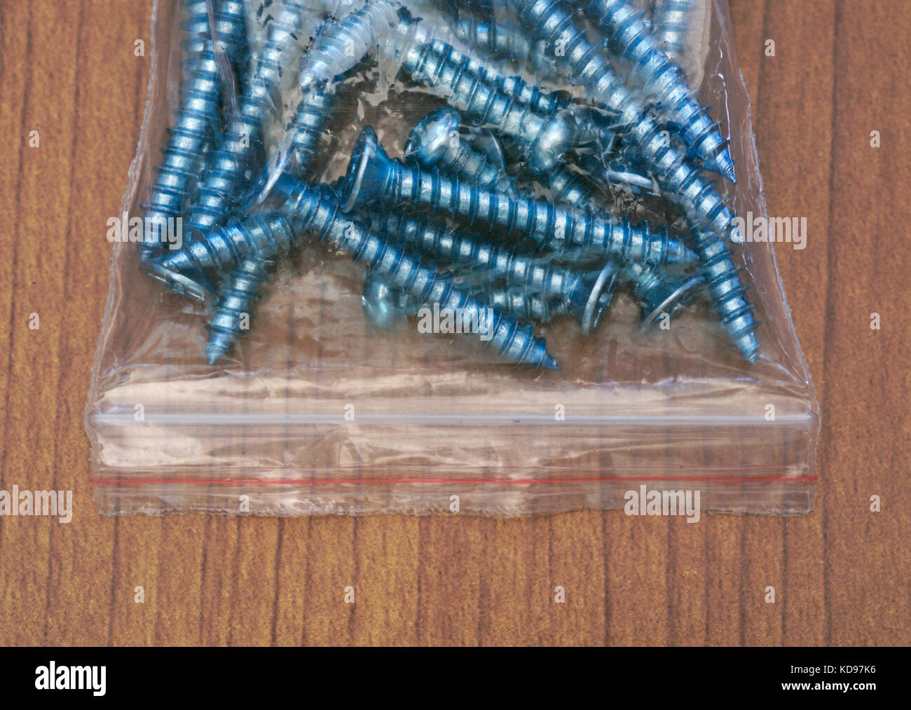 screws in plastic bag Stock Photo Alamy