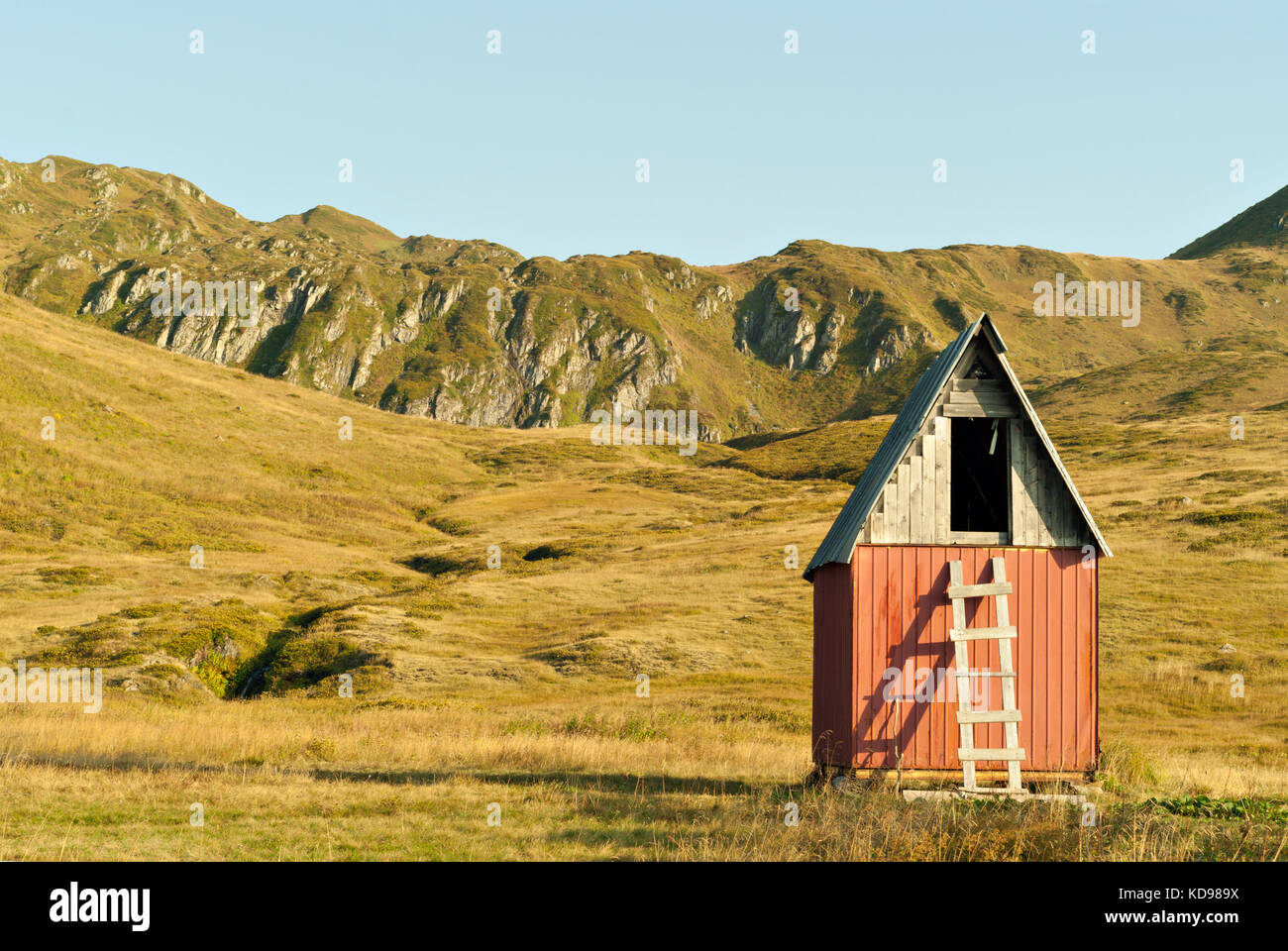 A Small Wooden Board House Without Windows And Doors With A Gable