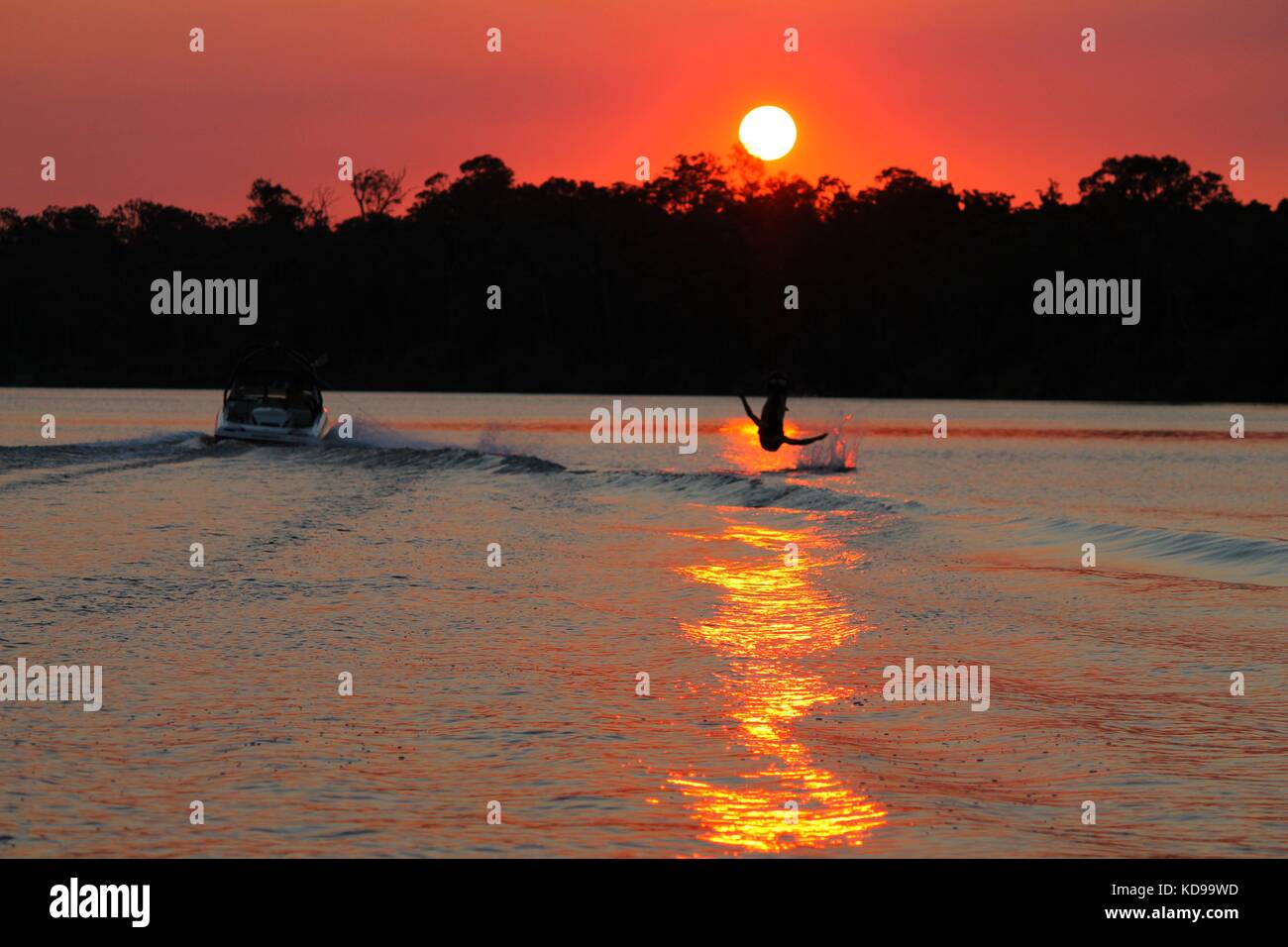 Sunset, Water sports, water ski Stock Photo