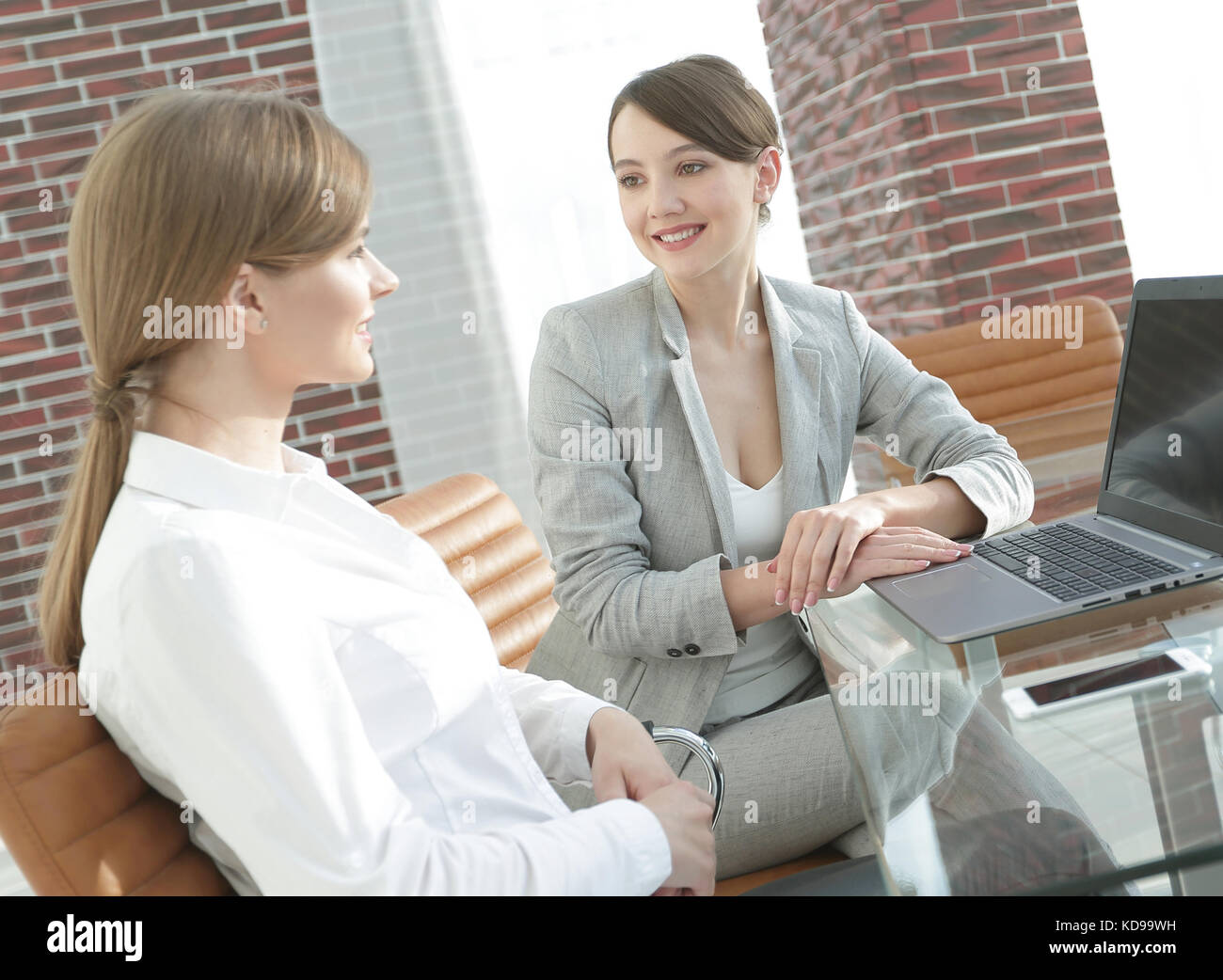business team discussing business issues in office Stock Photo - Alamy