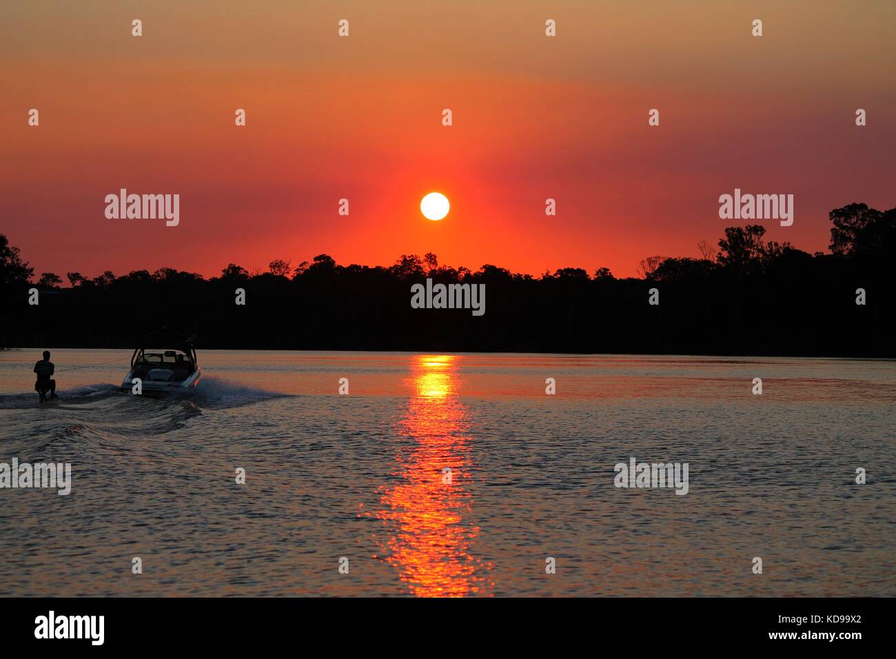 Sunset, Water sports Stock Photo