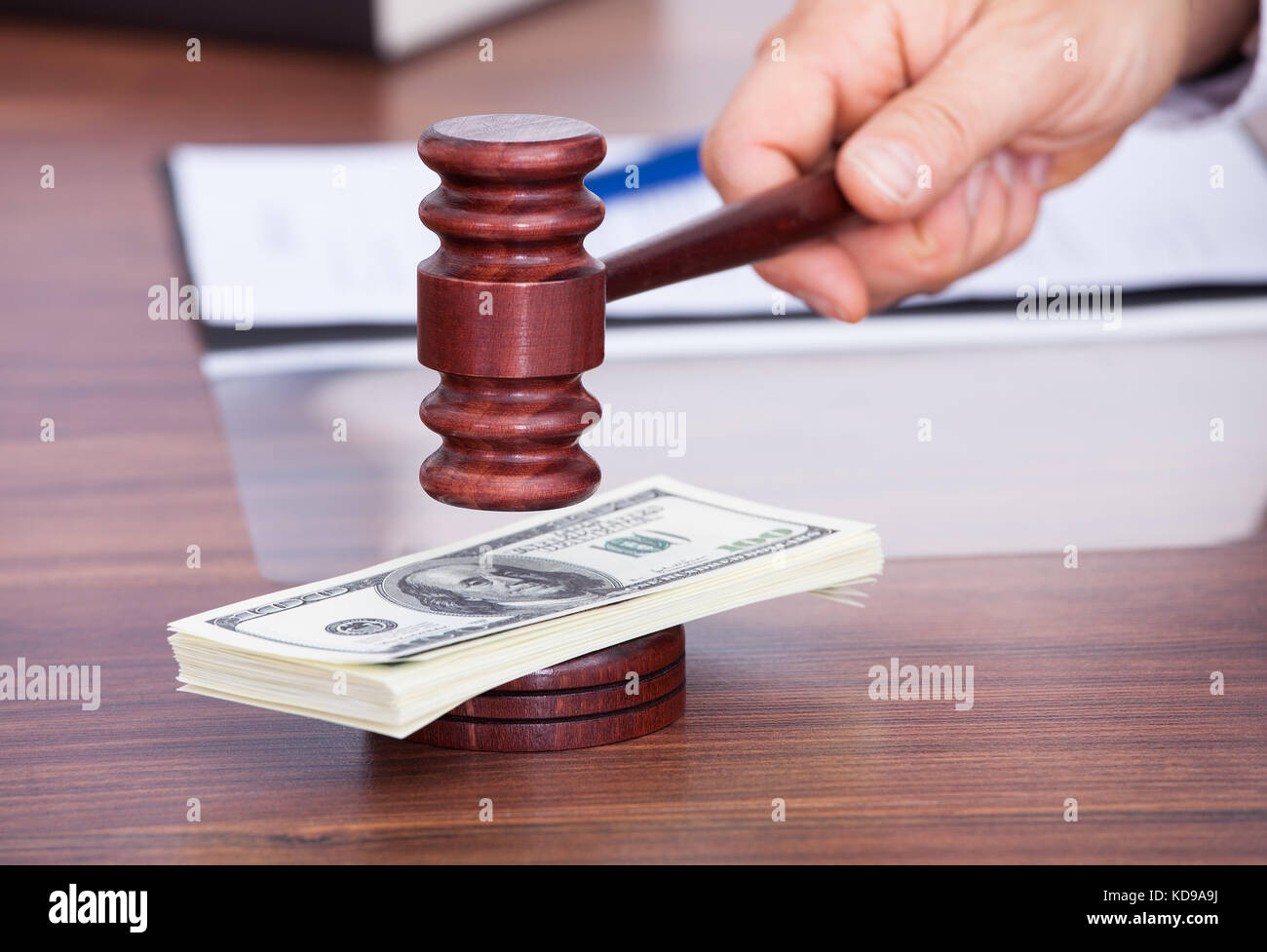 Closeup Of Male Judge Hitting Mallet On American Dollars Banknote Stock Photo Alamy