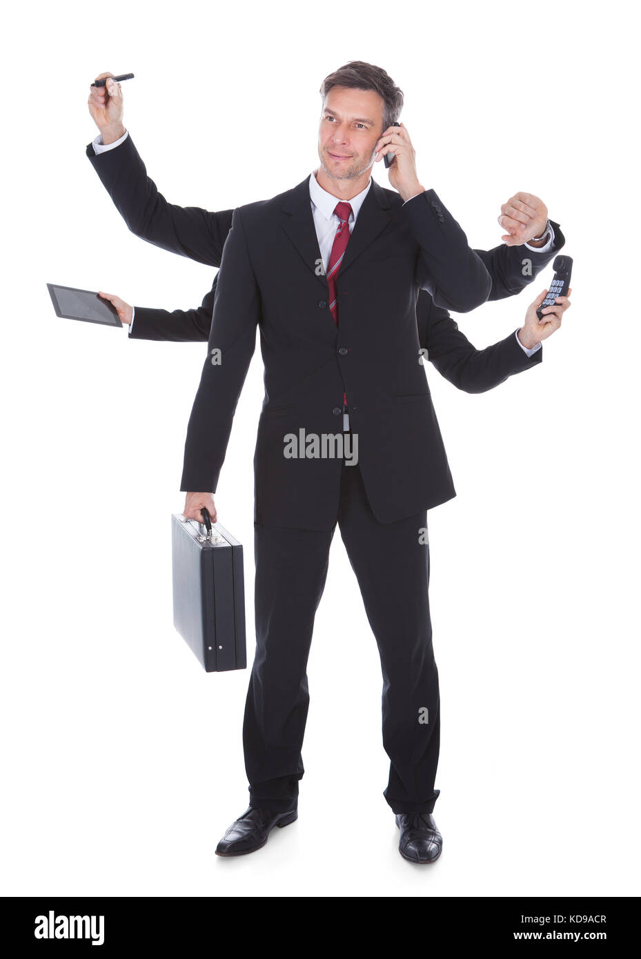 Portrait Of Mature Multitasking Businessman Isolated Over White Background Stock Photo