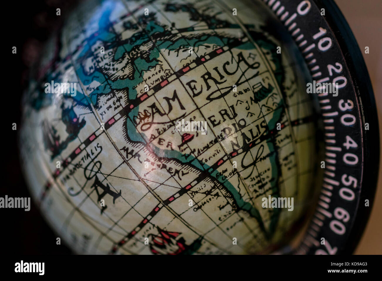 Map of America on globe map. Close up map of America on vintage globe map, macro. Stock Photo