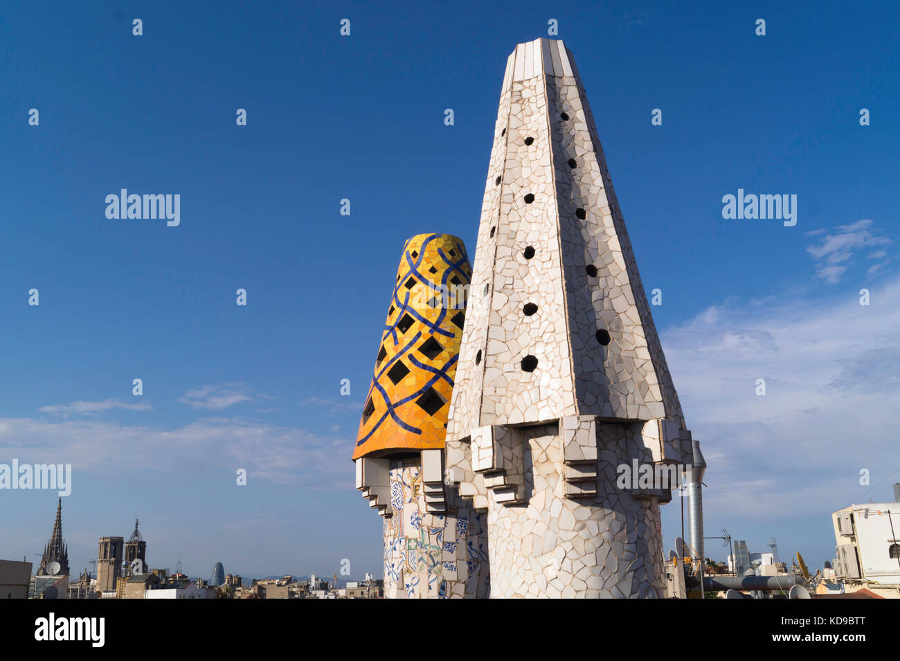 Two of the many chimneys on the roof of Antoni Gaudi's Palau Guell which is a short walk from La Rambla. Stock Photo