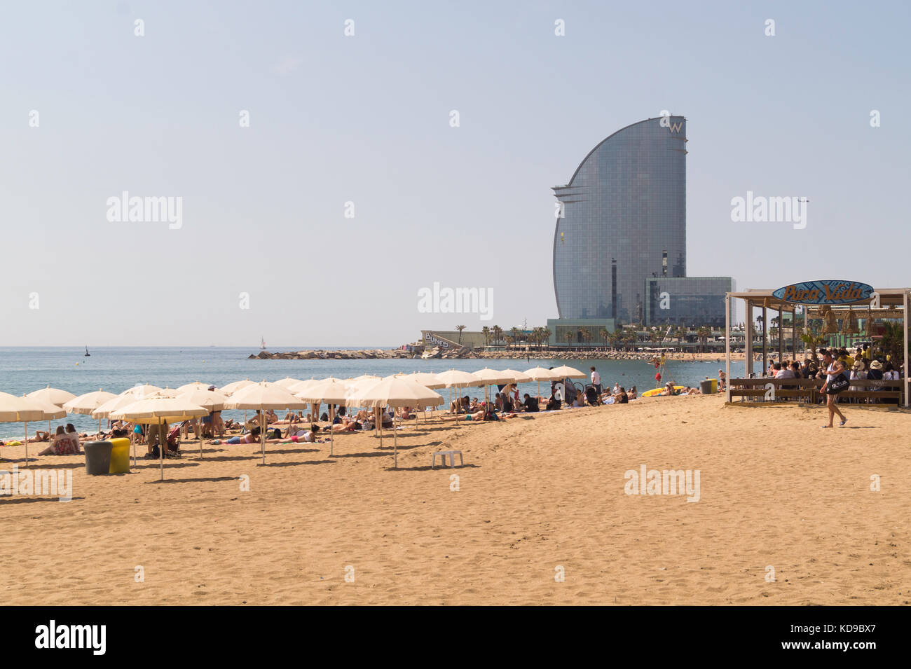 The beach at Barceloneta showing Hotel Vela in the distance.; Stock Photo
