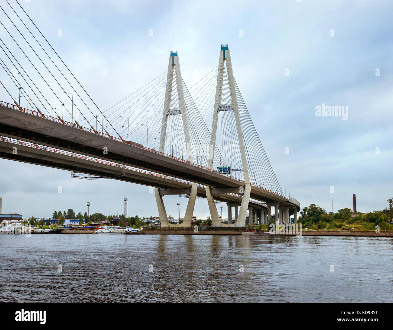 Big Obukhovsky bridge. Cable-stayed fixed bridge across Neva river in St. Petersburg. One of longest road bridges in Russia on gloomy autumn day Stock Photo