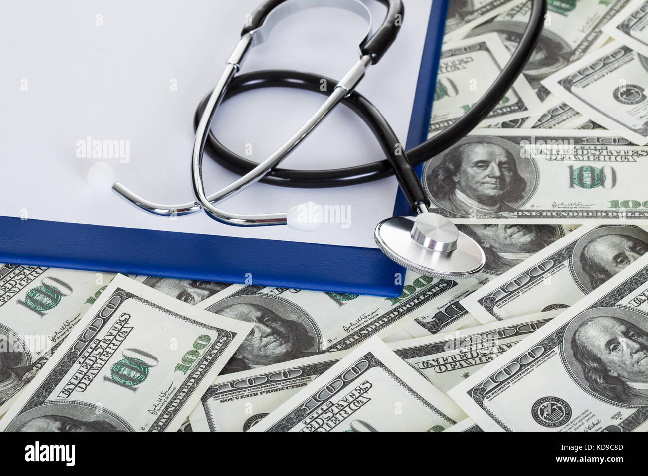 Photos of stethoscope and american dollar notes Stock Photo