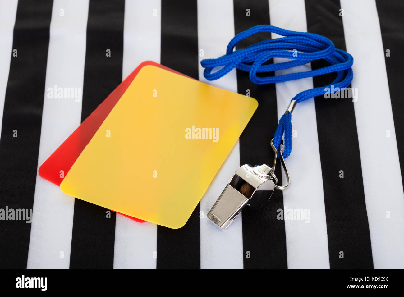 Soccer ball, whistle and cards. Isolated on white Stock Photo