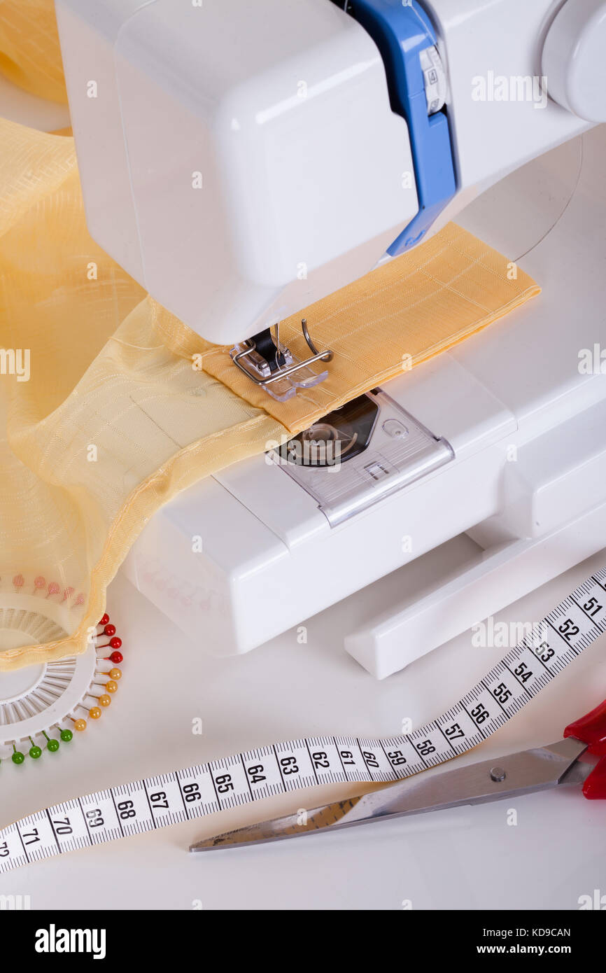 Sewing machine and related items. Isolated on white Stock Photo Alamy