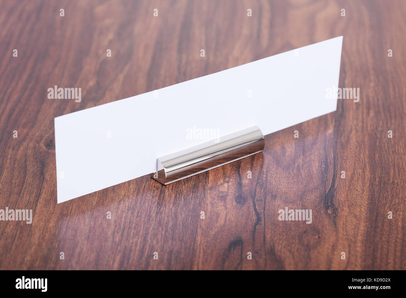 Close-up Of A Name Plate On Desk Stock Photo