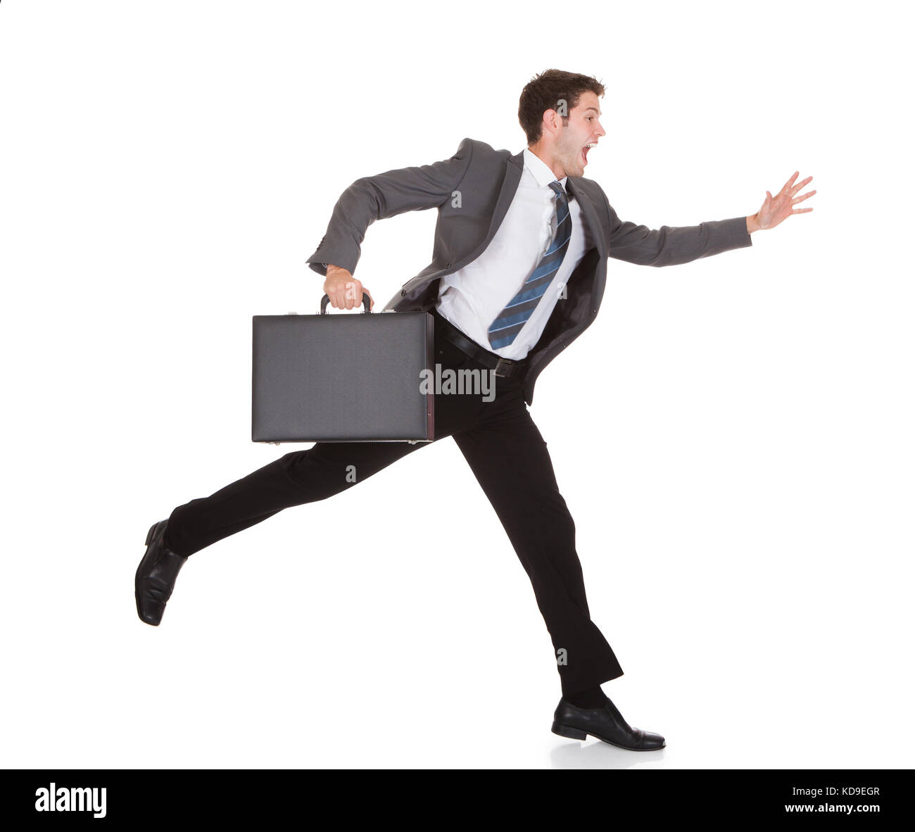 Businessman Running With Briefcase In Hand On White Background Stock