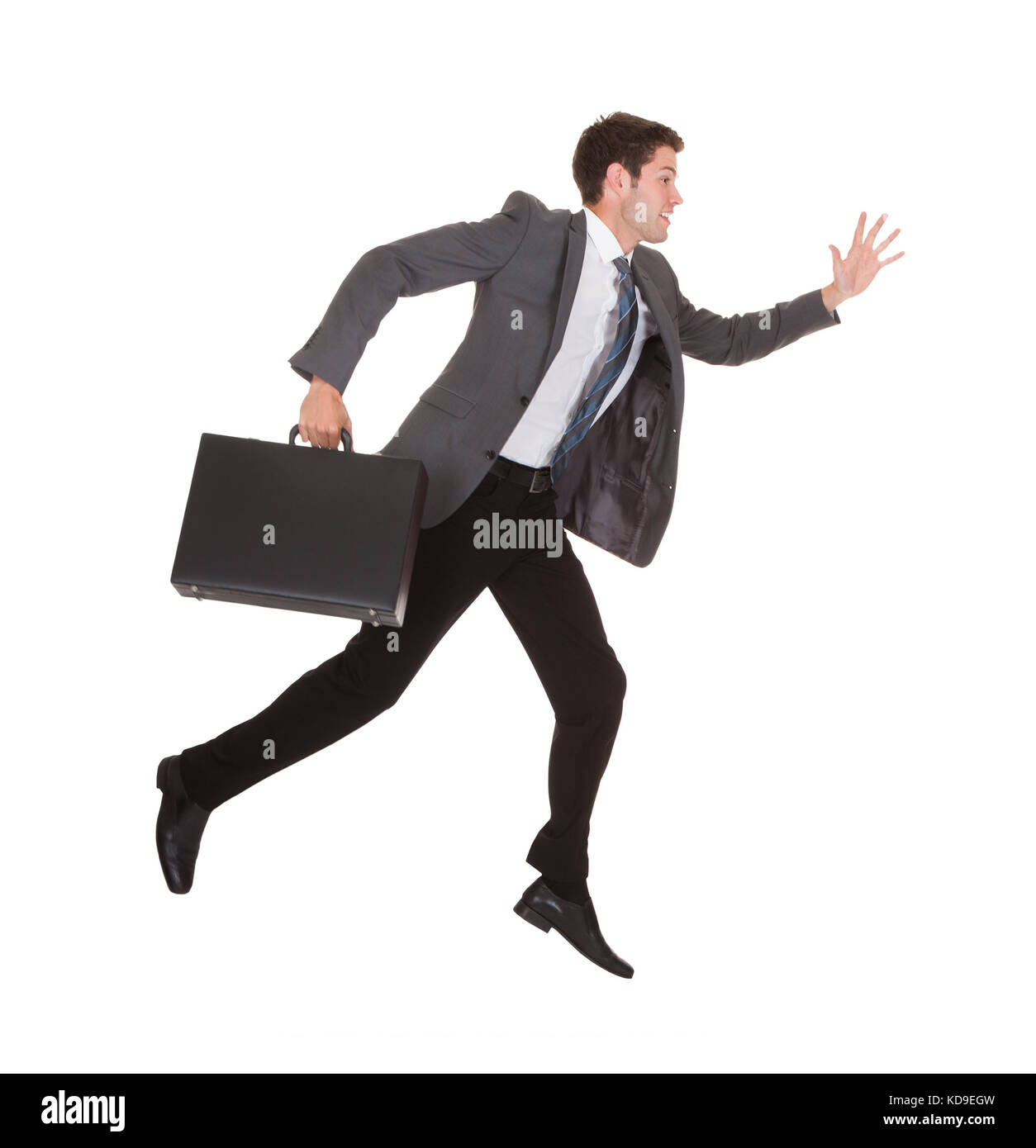 Man in suit briefcase running hires stock photography and images Alamy