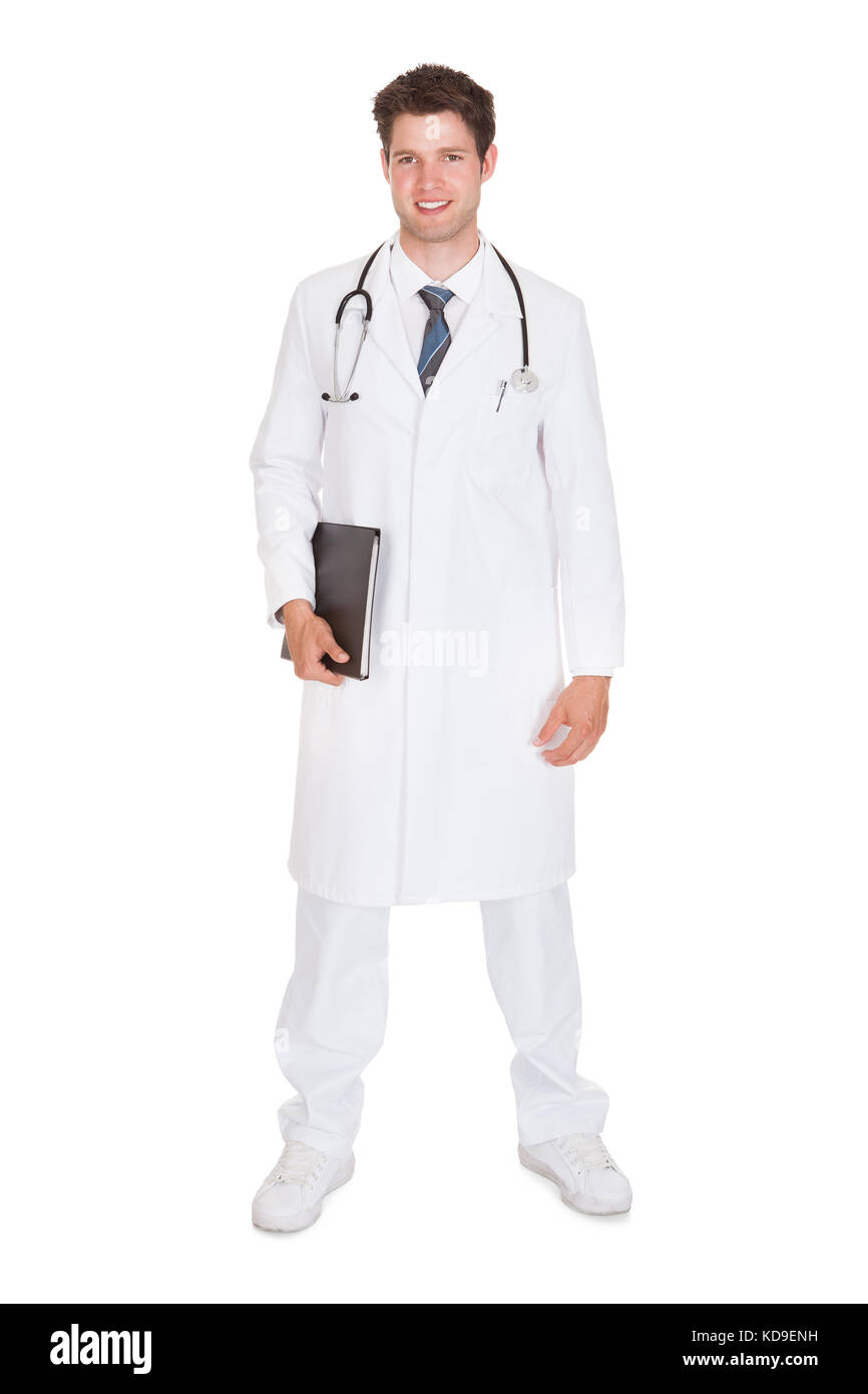 Male Doctor Holding Folder With Medical Reports Stock Photo