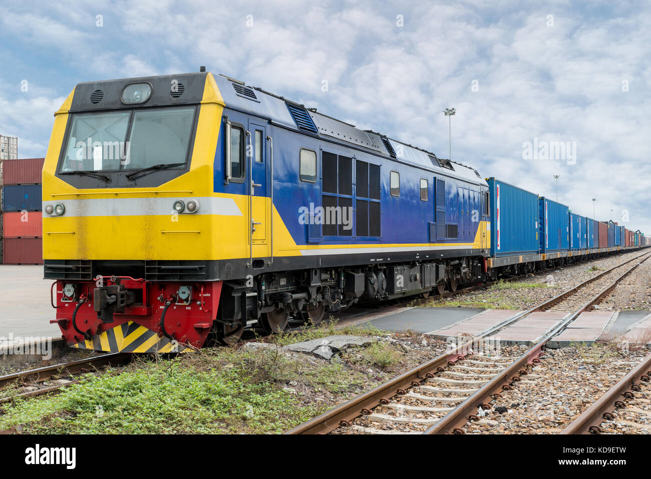 Cargo train platform with freight train container at depot in port use for export logistics background. Stock Photo