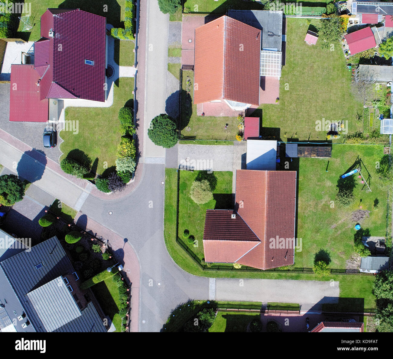 Single house in a new building settlement with houses and properties