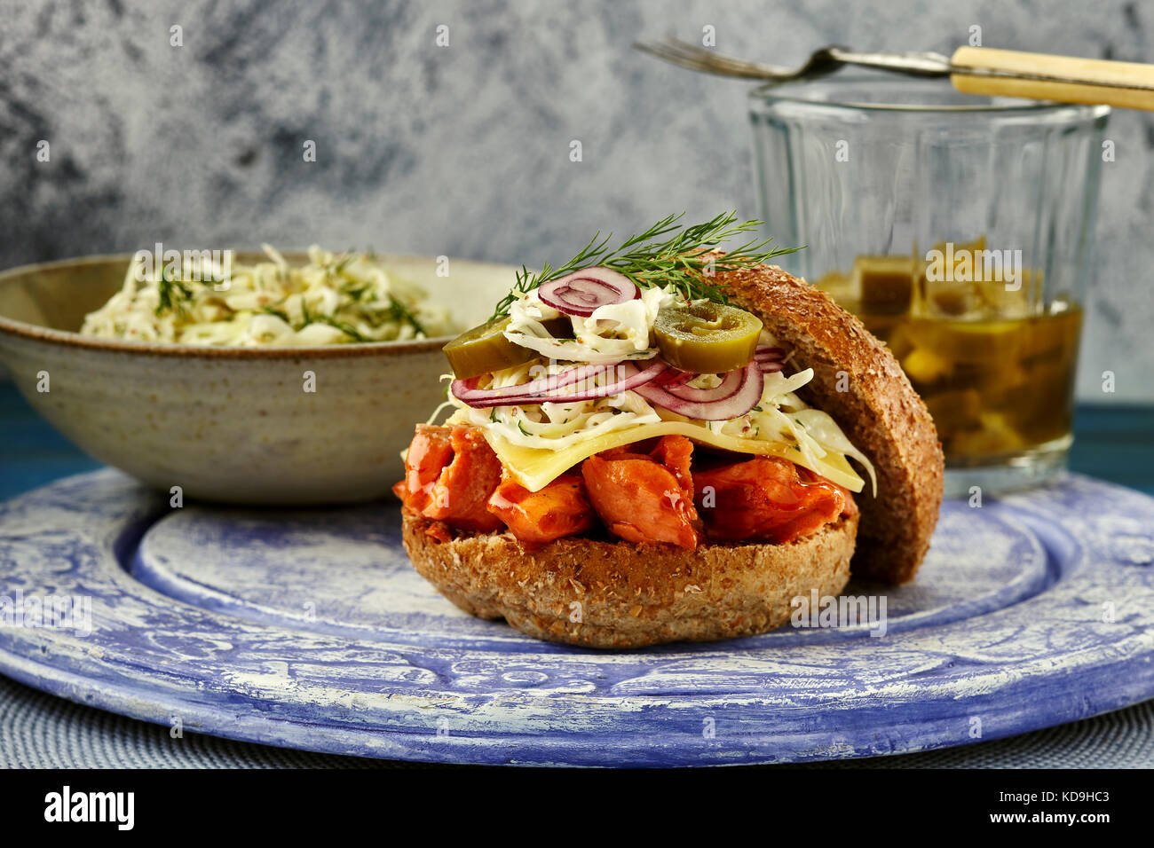 Honey barbecued pulled salmon burger Stock Photo