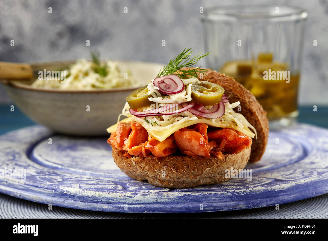 Honey barbecued pulled salmon burger Stock Photo