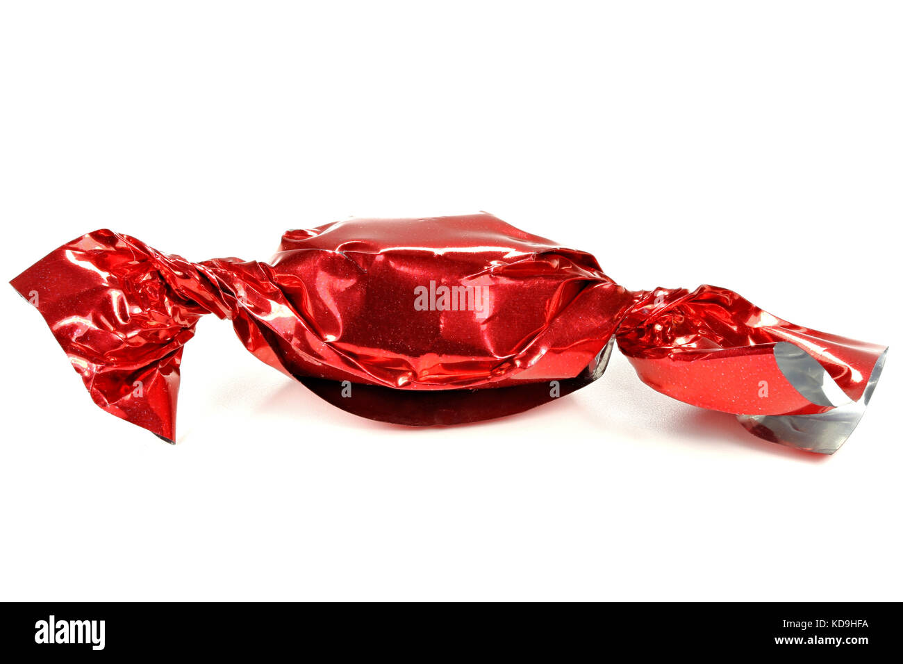 candy in red wrapper isolated on white background Stock Photo