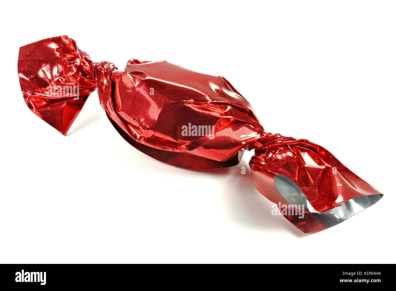 candy in red wrapper isolated on white background Stock Photo