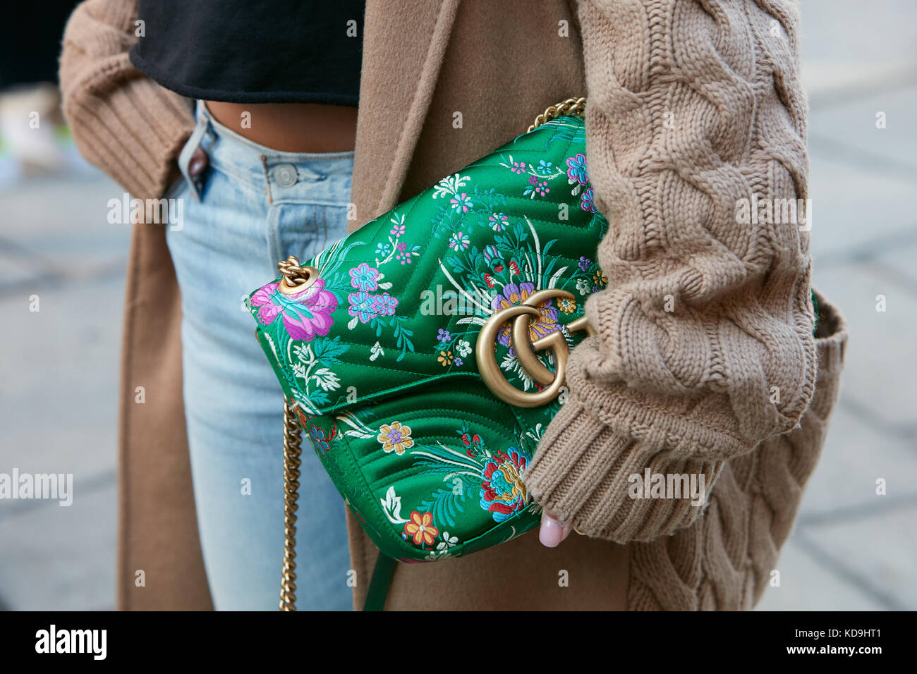 MILAN - SEPTEMBER 21: Woman with green floral design Gucci bag and beige  wool sweater before Max Mara fashion show, Milan Fashion Week street style  on Stock Photo - Alamy