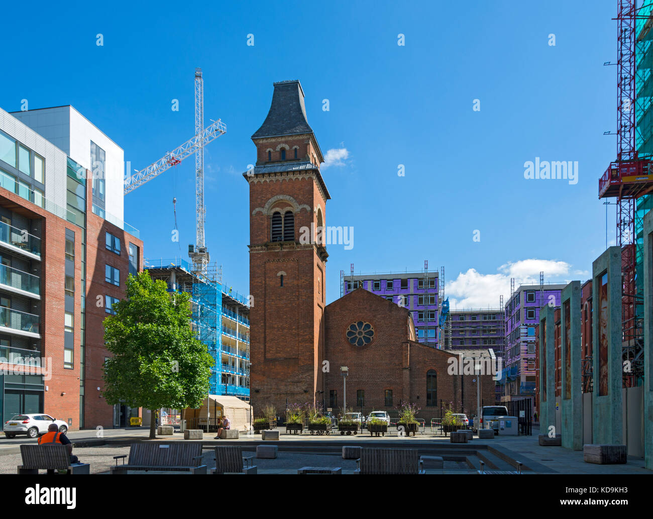 Cutting Room Square and the restored former church of St. Peter (now a rehearsal space for the Hallé Orchestra), Ancoats, Manchester, England, UK Stock Photo