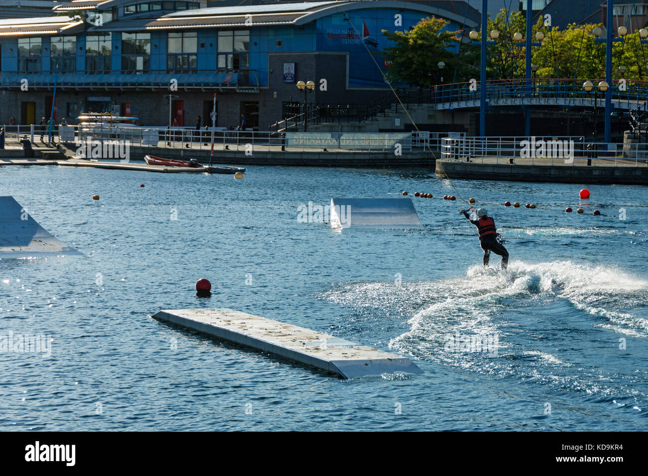A man wakeboarding at Salford Wake Park, Salford Quays, Manchester, England, UK Stock Photo