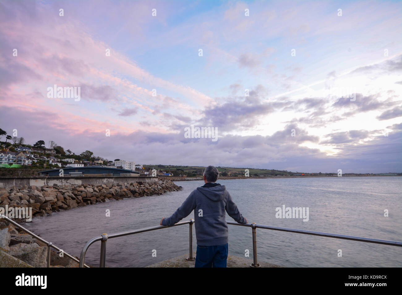 Penzance, Cornwall, UK. 11th October 2017. UK Weather. The clouds lifted briefly at sunrise over Penzance, however a damp day ahead has been forecast. Credit: Simon Maycock/Alamy Live News Stock Photo
