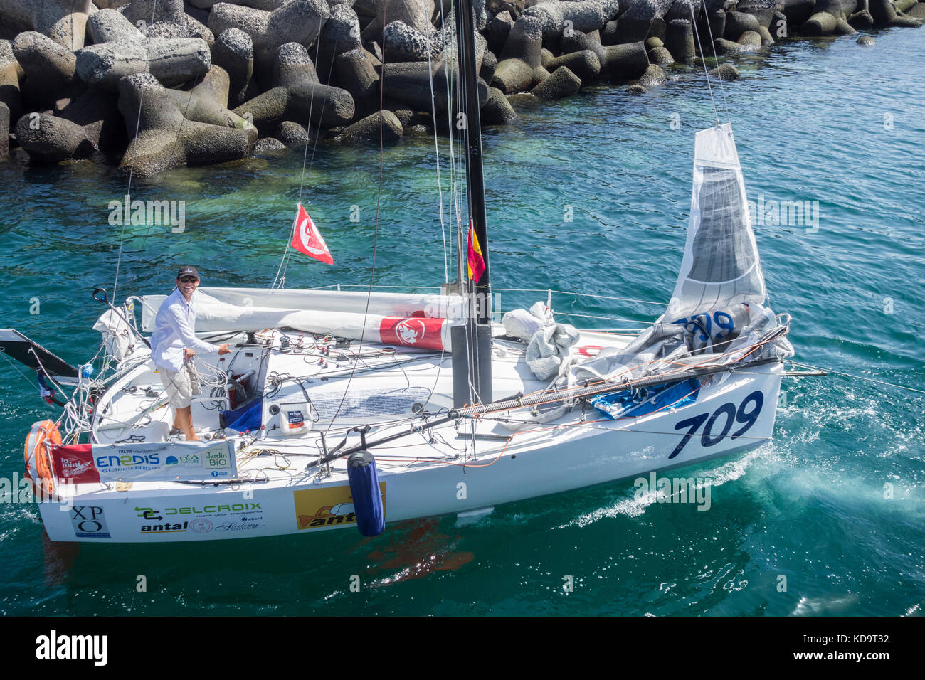 Las Palmas, Gran Canaria, Canary Islands, Spain.11th October, 2017. French sailor, Arthur Leopold Leger, in his yacht, Antal Expo, is the second yacht to arrive in Las Palmas, on thr first leg of the trans Atlantic `Minitransat` race . Around eighty yachts left La Rochelle in France on 1st October. The race is for single handed Mini 650 class yachts. First leg is La Rochelle to Las Palmas. Second leg, Las Palmas to Martinique in the Carribean. Credit: ALAN DAWSON/Alamy Live News Stock Photo