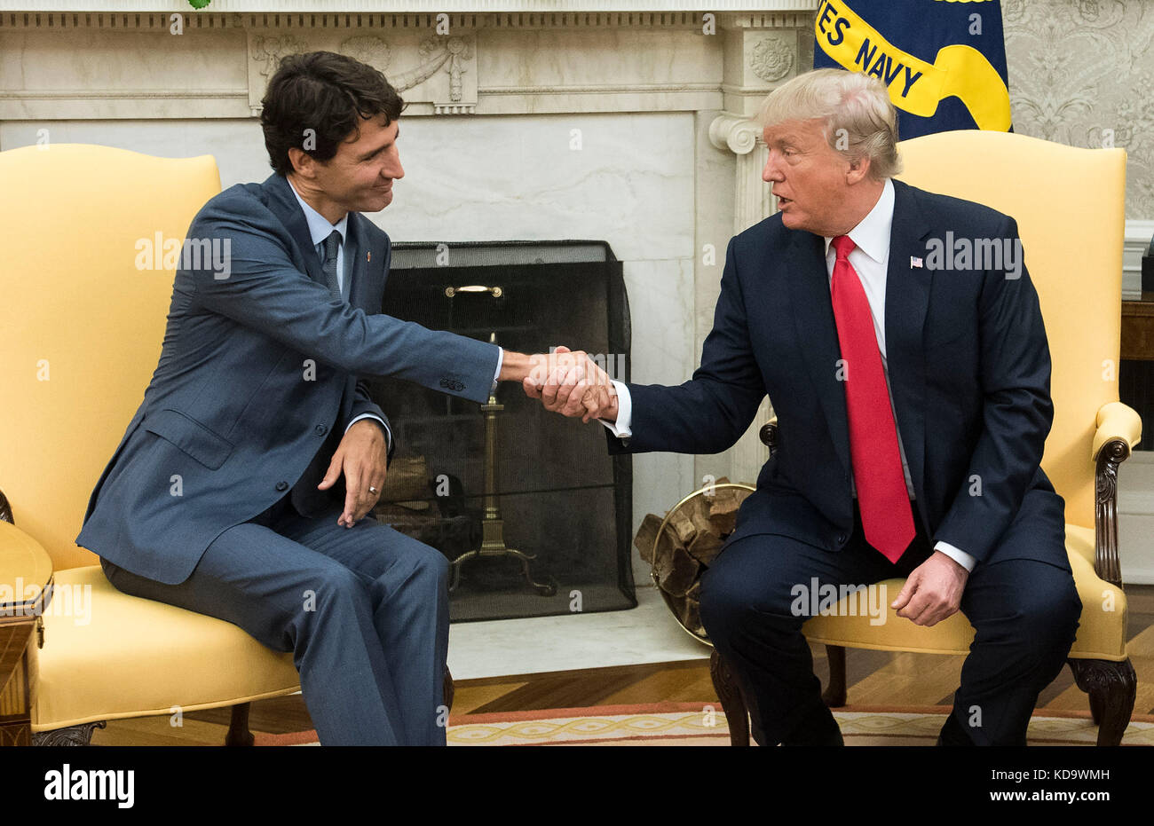 Washington DC, USA. 11th Oct, 2017. United States President Donald Trump shakes hands with Canadian Prime Minister Justin Trudeau during a meeting in the Oval Office at the White House in Washington, DC on October 11, 2017. Credit: Kevin Dietsch/Pool via CNP /MediaPunch Credit: MediaPunch Inc/Alamy Live News Stock Photo