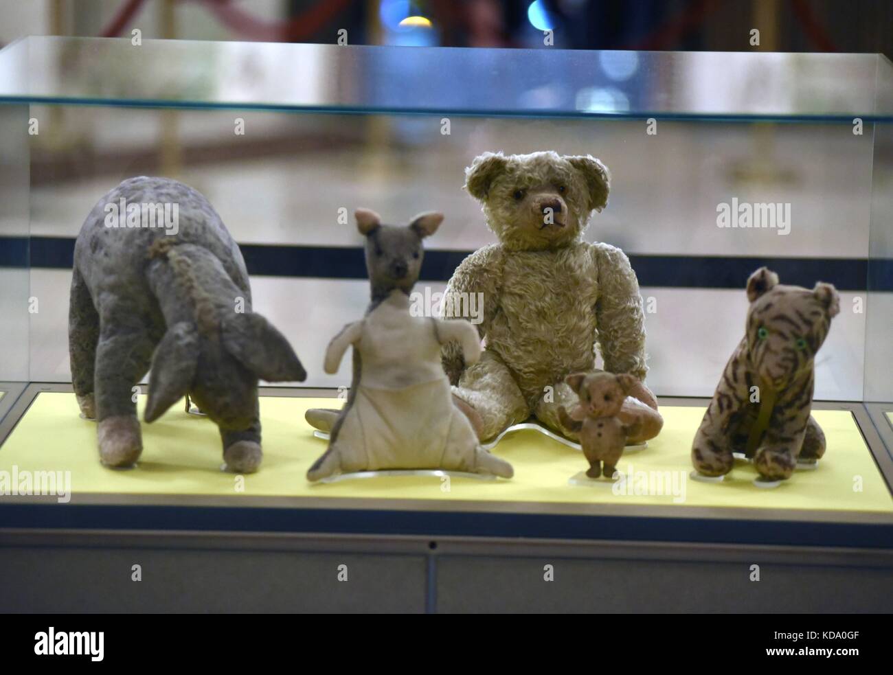New York, NY, USA. 11th Oct, 2017. Winnie-the-Pooh original dolls, Eeyore, Kanga, Winnie the Pooh, Piglet, Tigger at arrivals for GOODBYE CHRISTOPHER ROBIN Premiere, Astor Hall at The New York Public Library, New York, NY October 11, 2017. Credit: Derek Storm/Everett Collection/Alamy Live News Stock Photo