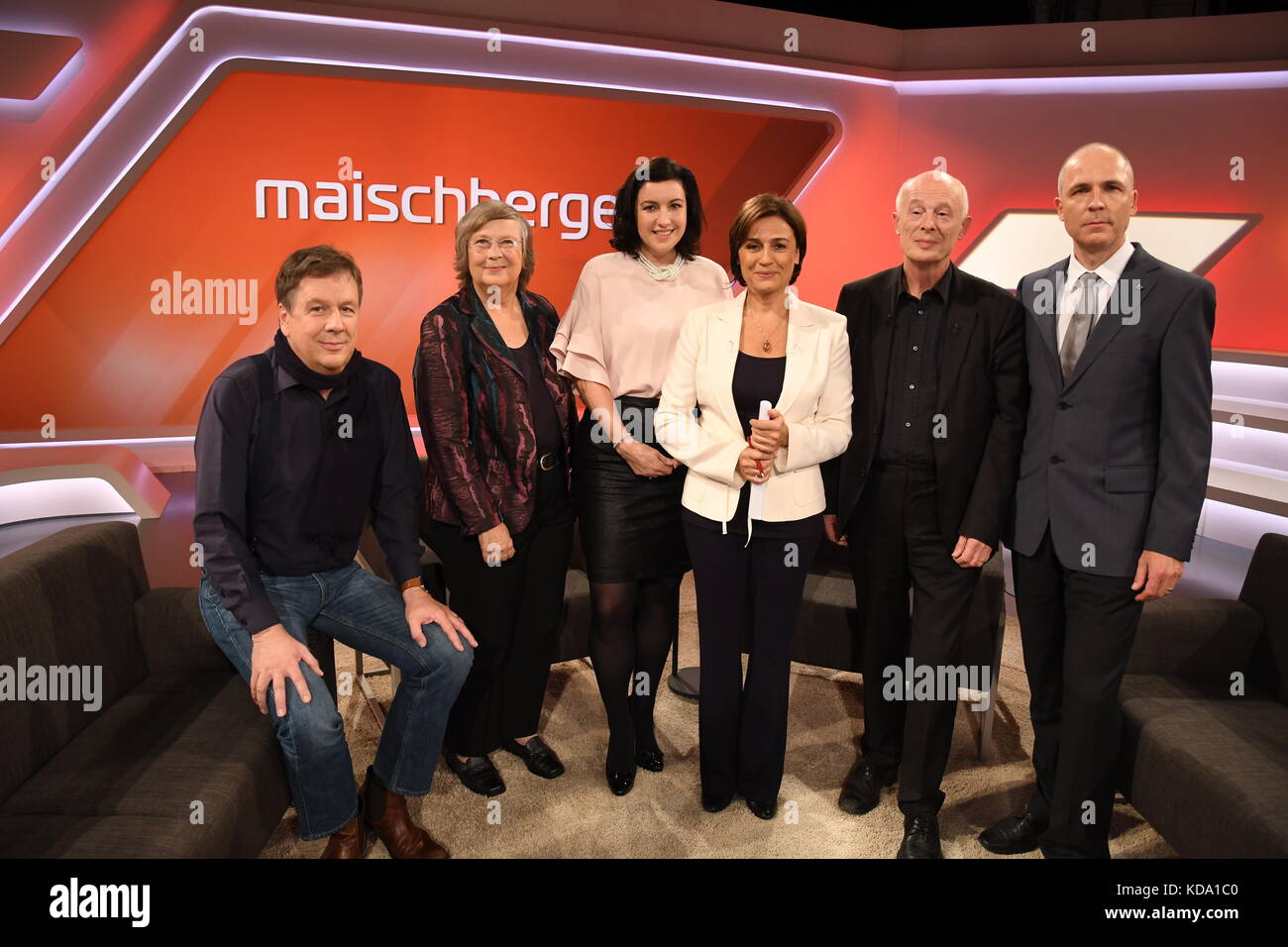Cologne, Germany. 11th Oct, 2017. Guests of the ARD talk show 'Maischberger' pictured on set during filming of the episode with the topic 'Storm Xavier and weather extremes: is our climate changing?' in Cologne, Germany, 11 October 2017. Left to right: Jorg Kachelmann, Barbel Hohn, Dorothee Bar, Sandra Maischberger, Hans Joachim Schellnhuber and Alex Reichmuth. Credit: Horst Galuschka/dpa/Alamy Live News Stock Photo